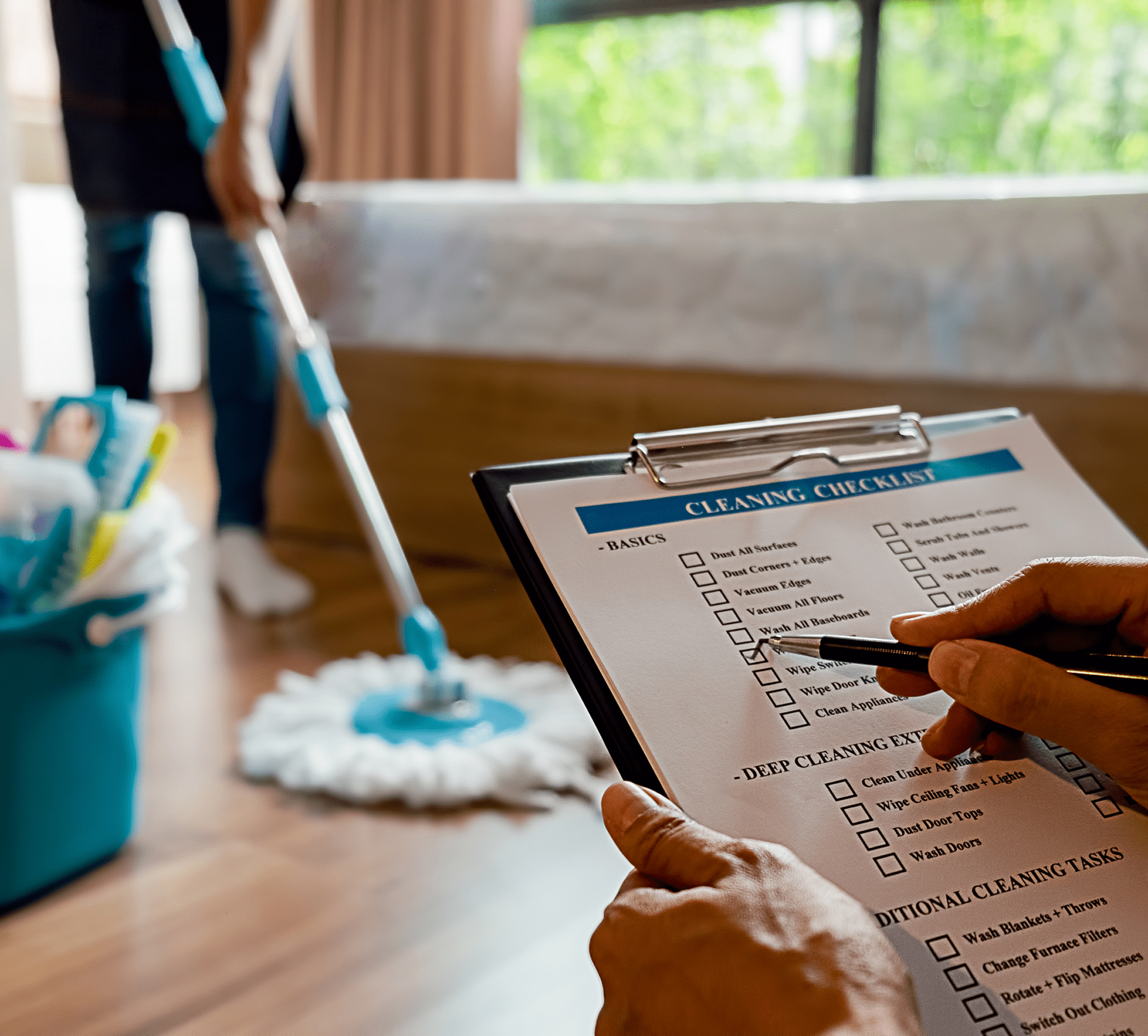 Cleaning checklist with person mopping floor.